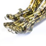 ALBEN, Christ Bullets, douilles, résine, 240 x 80 x 25 cm (dont piedestal 100 cm)